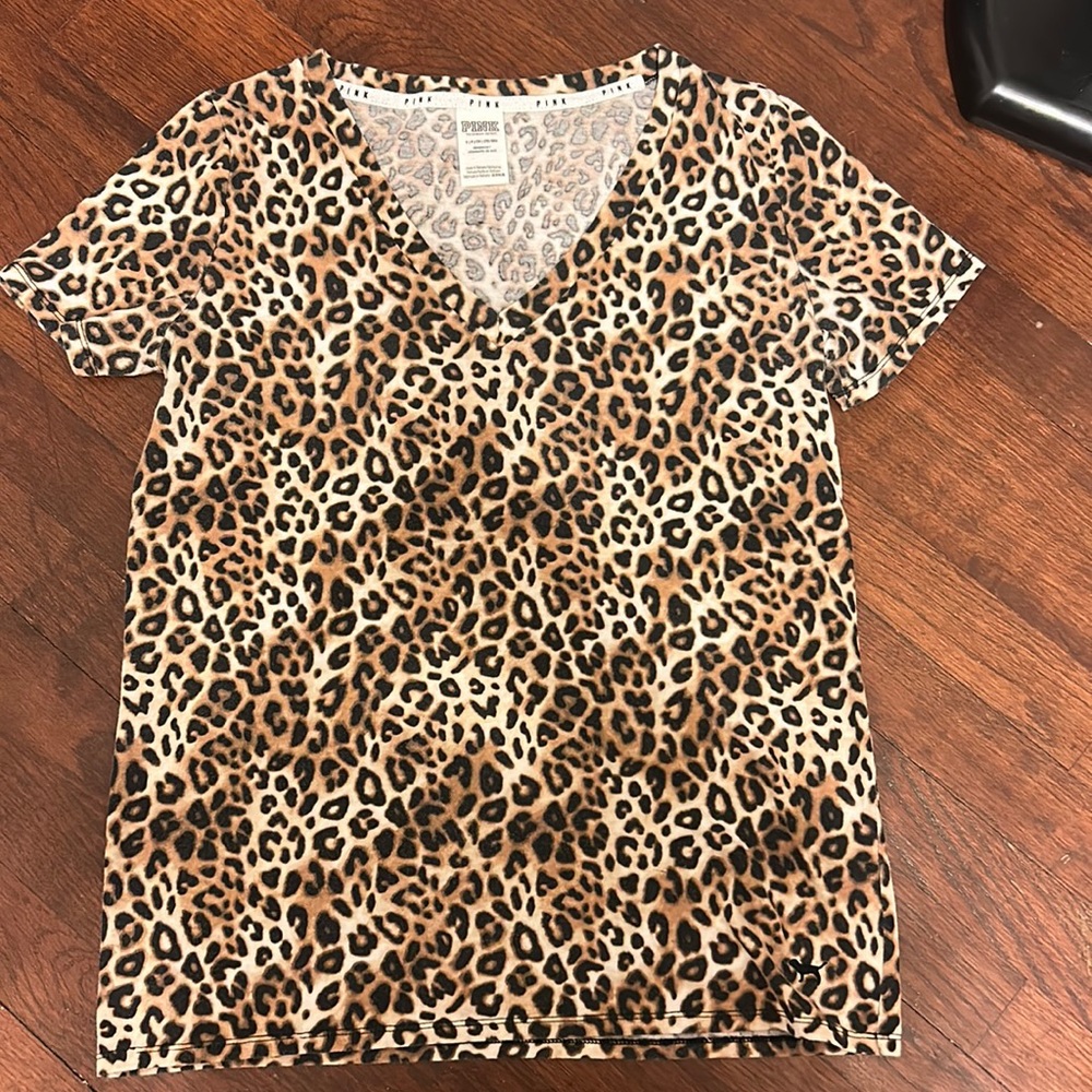 Size S pink cheetah print shirt!! So adorable and barley worn!